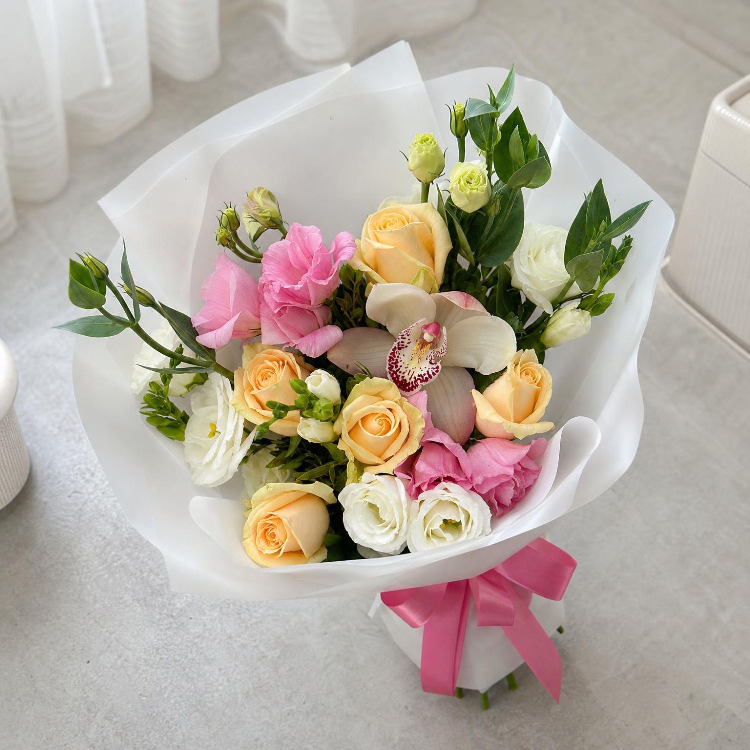 cream rose, white freesia, white eustoma, pink eustoma, pink cymbidium, packaging, ribbon